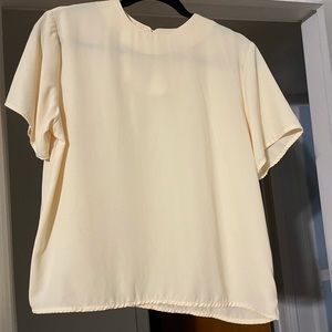 Cream colored blouse